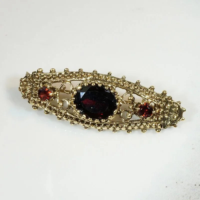 Ornate Victorian Revival Garnet & Gold Brooch